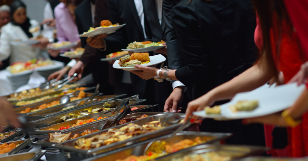 8 quiet things someone does at a buffet that reveal whether they grew up in a household of scarcity or abundance — and the most telling one is what they do after they’ve already served a full plate
