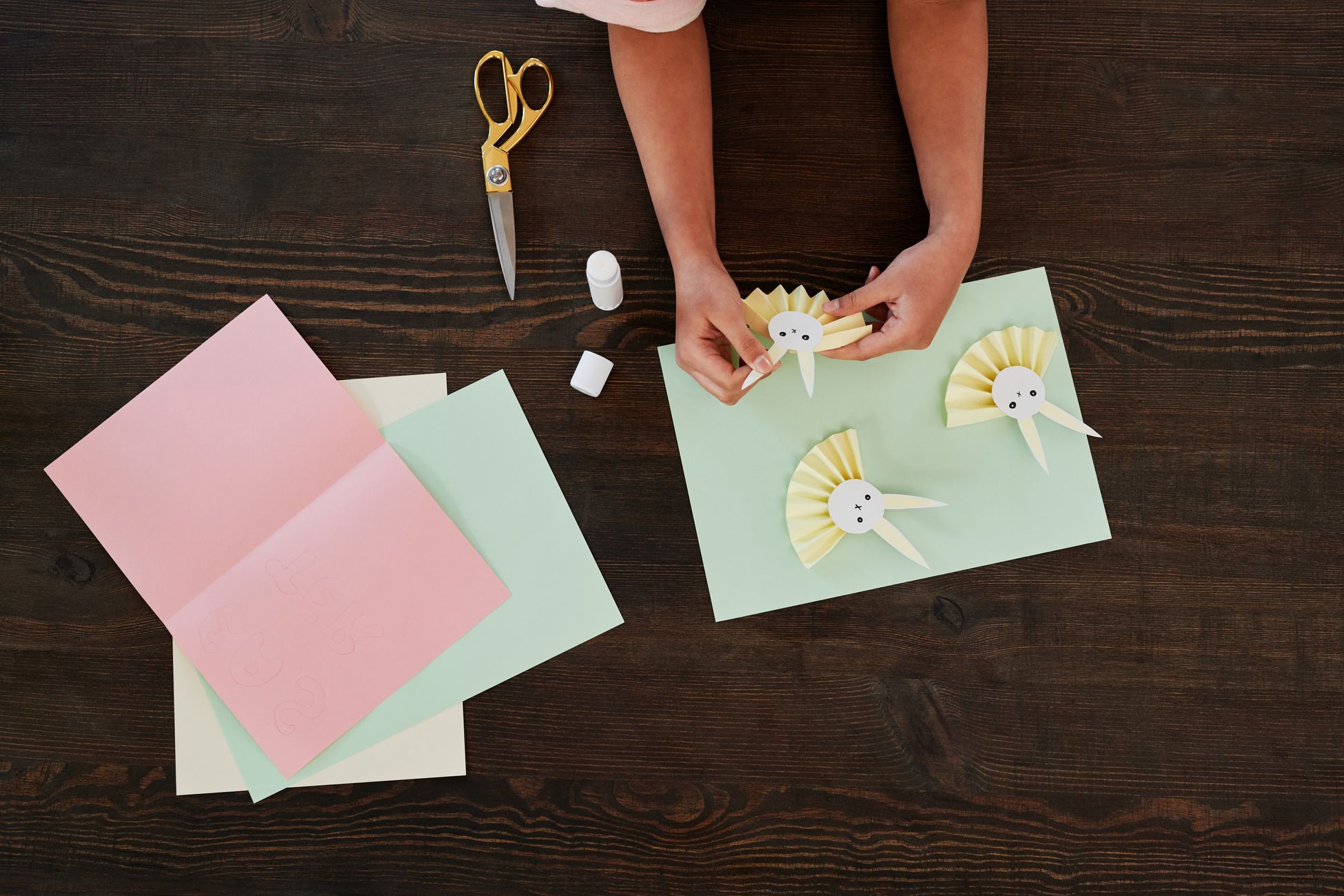 Hands holding a folded paper map, symbolizing the risk of being deeply known.