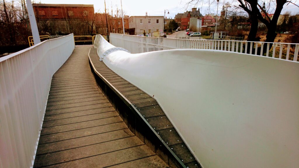 In Denmark, a retired wind-turbine blade was cut and rebuilt as a bike shelter, turning one of the hardest-to-recycle parts of a wind farm into a roof people lock bikes under every day